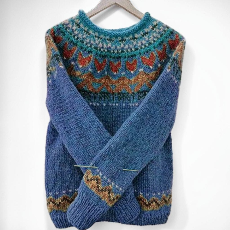 Vivian &amp; Cole Ivana vintage blue jacquard crew neck sweater with intricate patterned yoke and cuffs in snowy setting