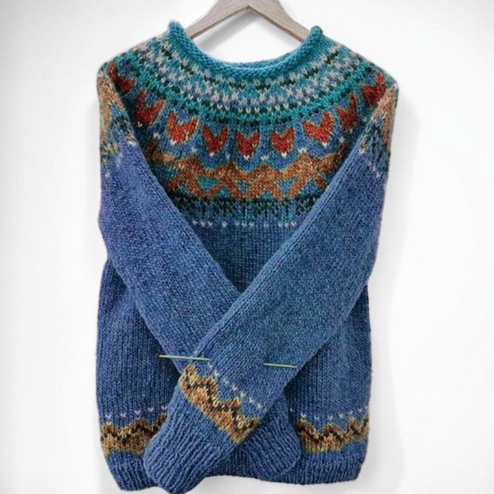 Vivian &amp; Cole Ivana vintage blue jacquard crew neck sweater with intricate patterned yoke and cuffs in snowy setting