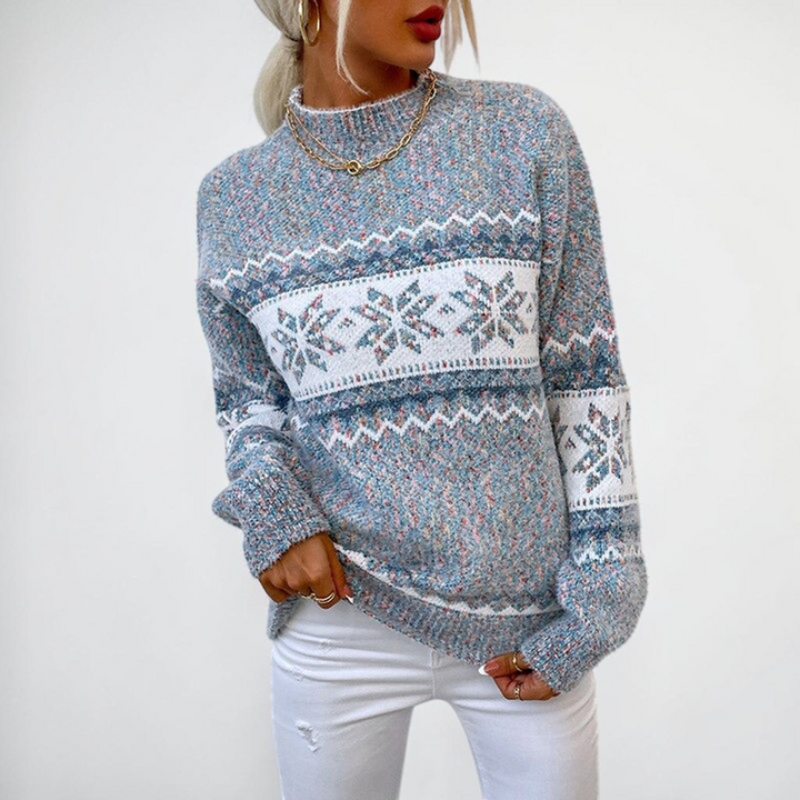Vivian &amp; Cole Kathy vintage sweater with blue speckled knit, snowflake patterns, and a comfortable mid-height collar