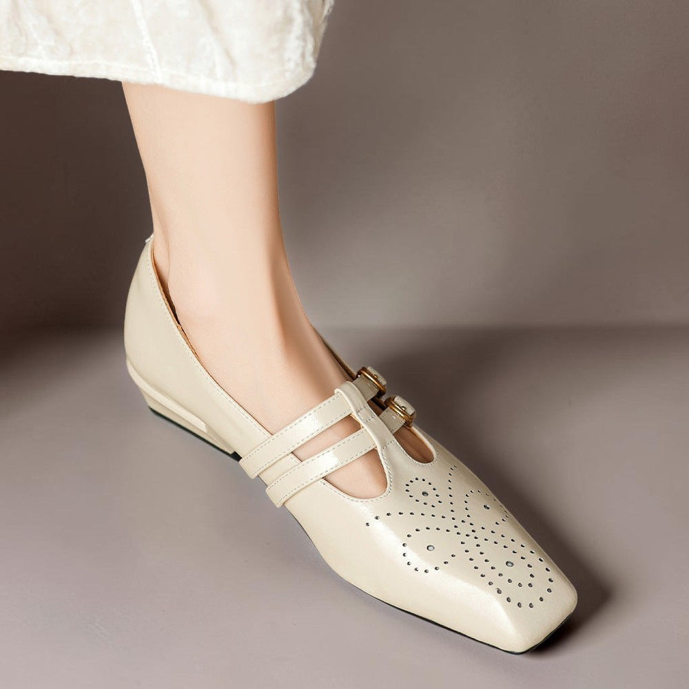 Vivian &amp; Cole Marisol beige leather Mary Jane pump with brogue detailing, dual buckled straps, and a low block heel.