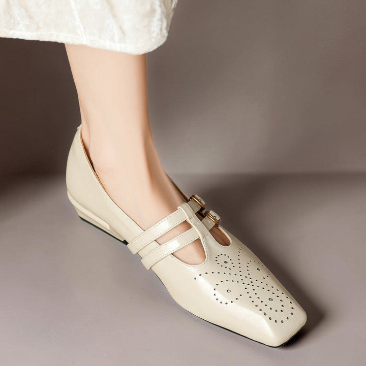 Vivian &amp; Cole Marisol beige leather Mary Jane pump with brogue detailing, dual buckled straps, and a low block heel.