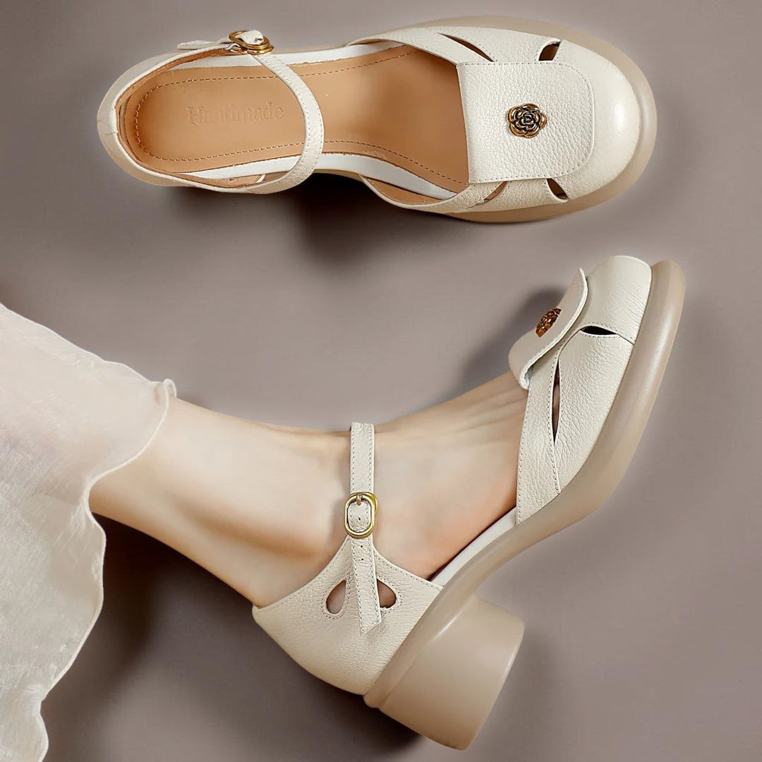 Vivian &amp; Cole beige ankle strap platform sandals with a floral accent and cushioned footbed on a neutral background