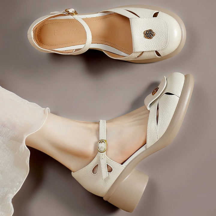 Vivian &amp; Cole beige ankle strap platform sandals with a floral accent and cushioned footbed on a neutral background