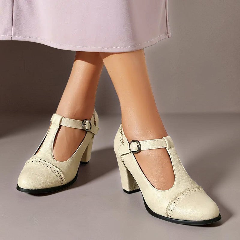 Vivian &amp; Cole Wilhelmina beige T-strap brogue heels with a steady block heel and classic punched detailing