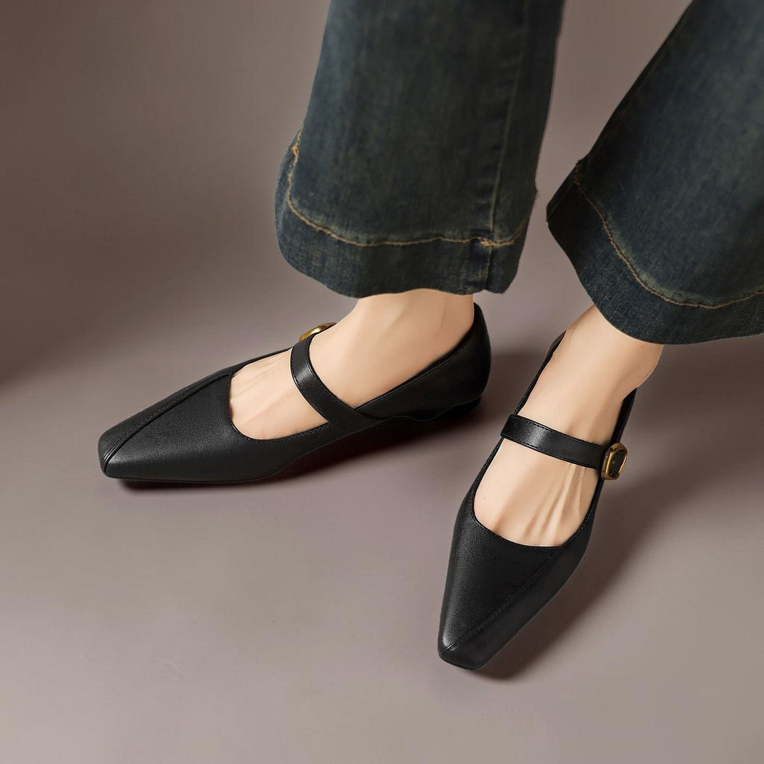 Vivian &amp; Cole Zorae black leather paneled Mary Jane heels with a gold-tone buckle and low block heel