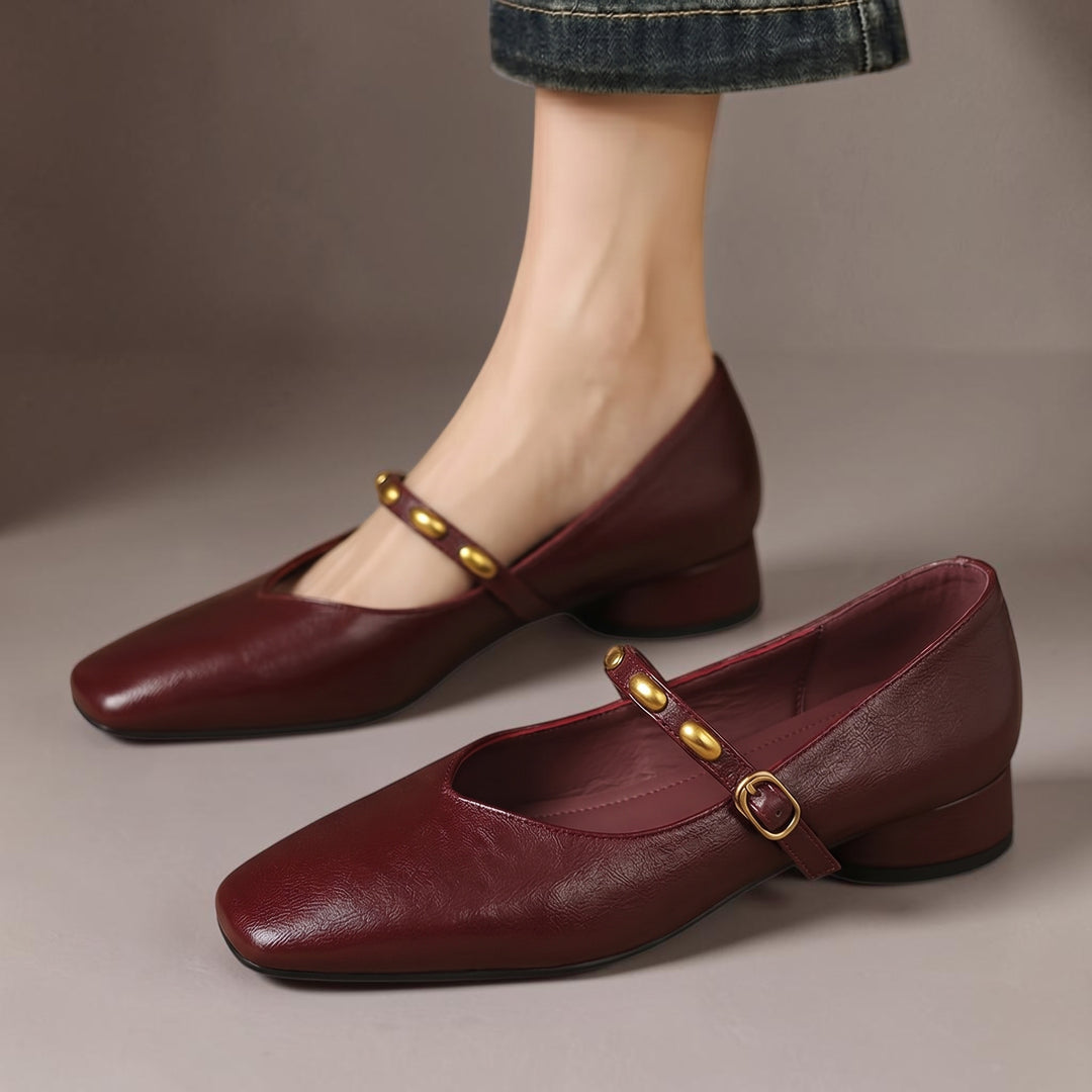 Vivian & Cole Zyra burgundy genuine leather Mary Jane flats with a square toe, low block heel, and gold-tone buckle.