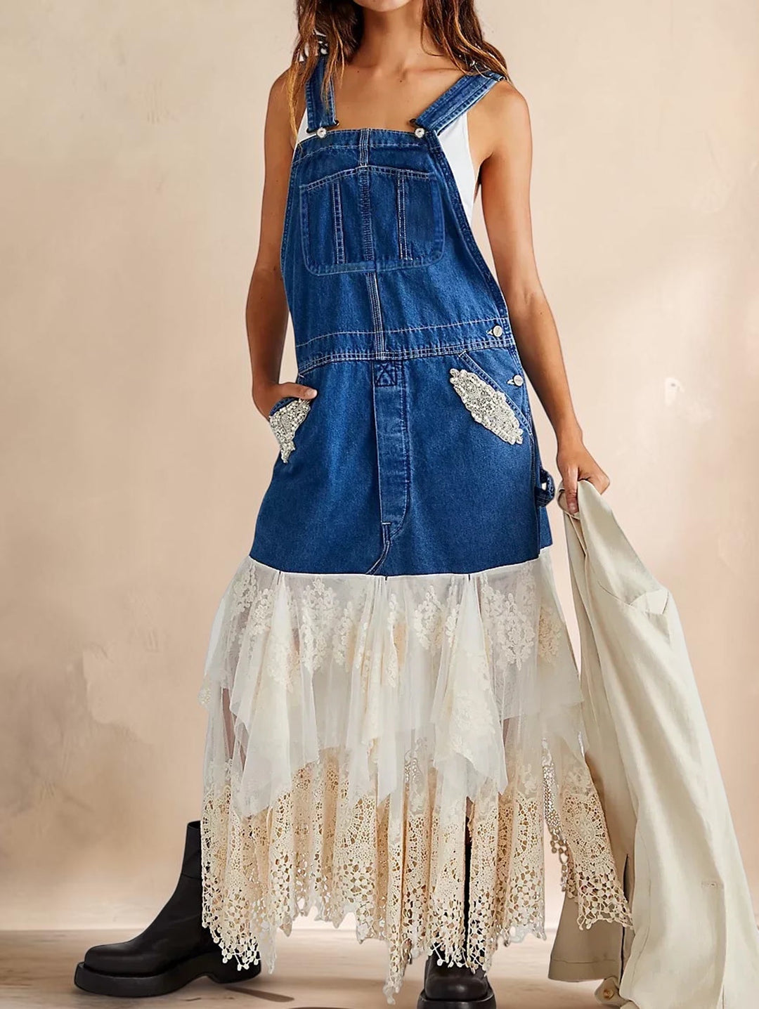 Vivian &amp; Cole blue denim pinafore dress featuring lace patchwork panels, an irregular hem, and deep front pockets.
