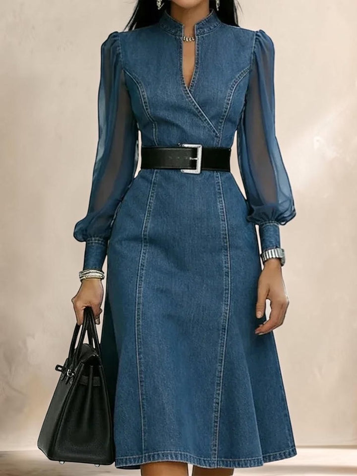 Vivian &amp; Cole Amandine blue denim maxi dress with sheer puff sleeves, V-neckline, and a black waist belt.
