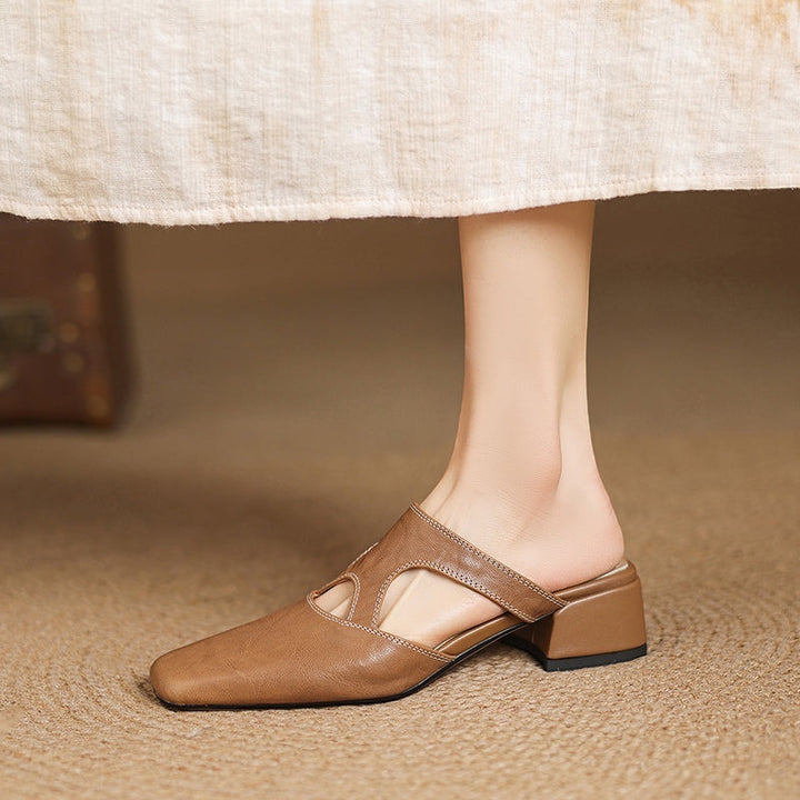 Vivian &amp; Cole Dessa brown genuine leather mules with square toe, cut-out details, and a comfortable low block heel.