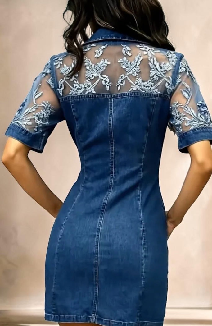 Vivian &amp; Cole blue denim shirt dress featuring intricate lace patchwork panels on the shoulders and short sleeves.