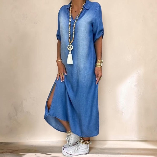 Vivian &amp; Cole Anthyrah denim midi dress with rolled sleeves, side split, and loose fit styled with white sneakers.