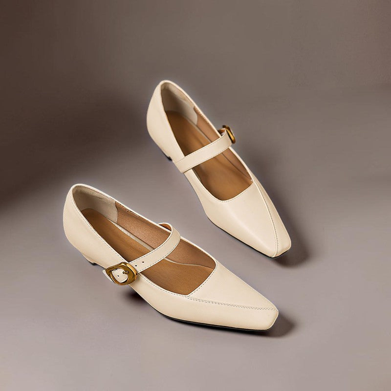 Vivian &amp; Cole Zorae beige leather Mary Jane heels featuring paneled stitching, a gold-tone buckle, and a low block heel.