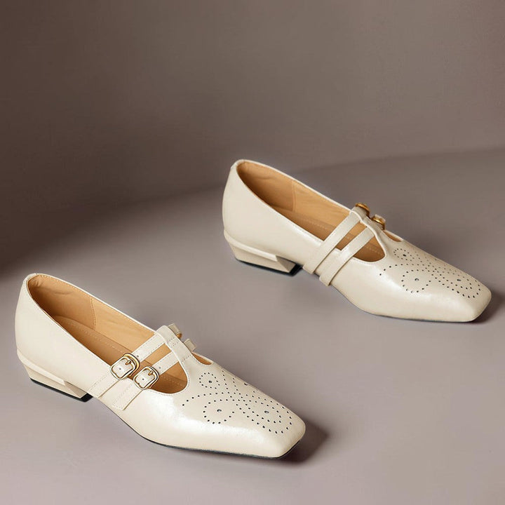 Vivian &amp; Cole Marisol beige leather mary jane pumps with brogue detailing, dual buckled straps, and a low block heel.