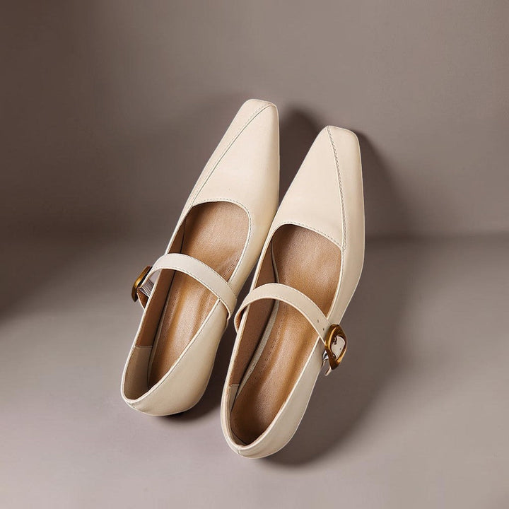 Vivian &amp; Cole beige paneled leather Mary Jane heels featuring a statement gold-tone buckle and low block heel