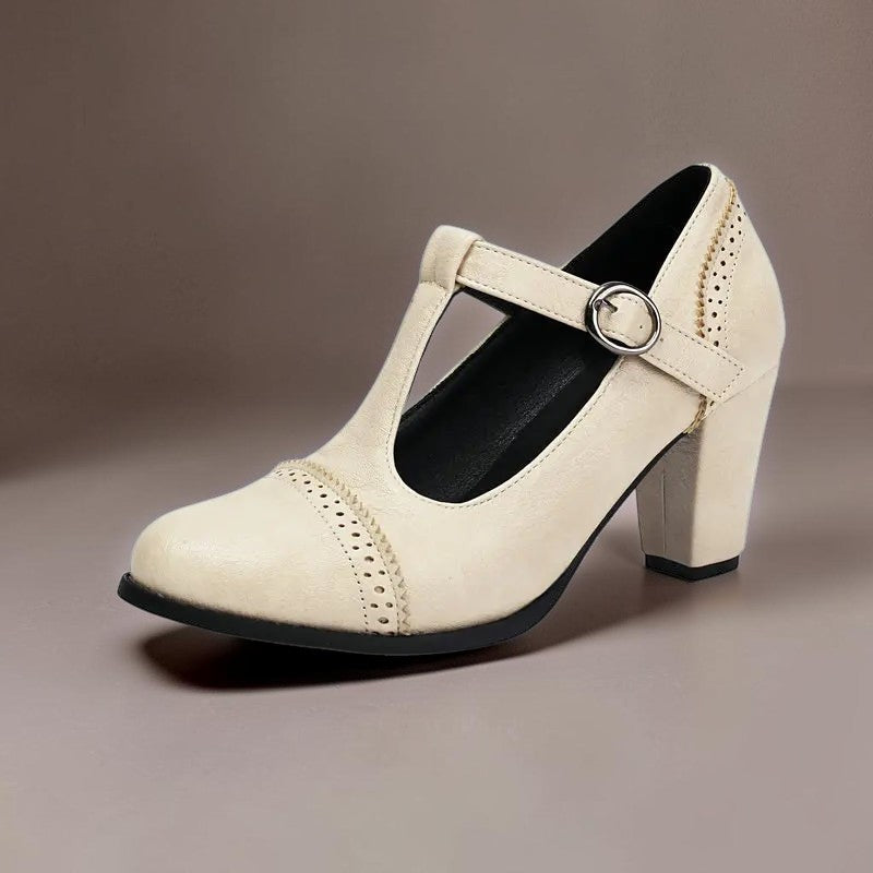 Vivian &amp; Cole Wilhelmina beige T-strap brogue heels with a steady block heel and classic punched detailing
