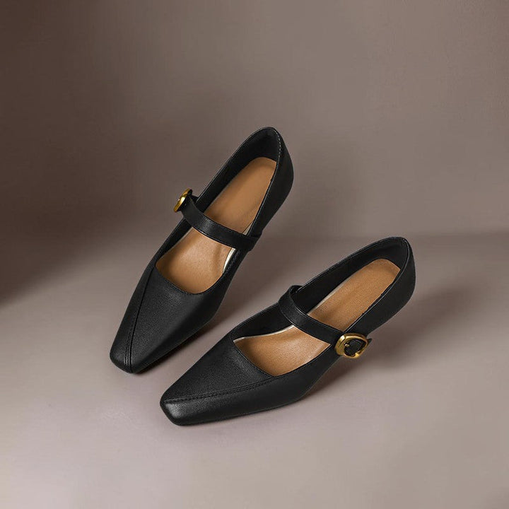 Vivian &amp; Cole black leather paneled Mary Jane heels with a gold-tone buckle and low block heel