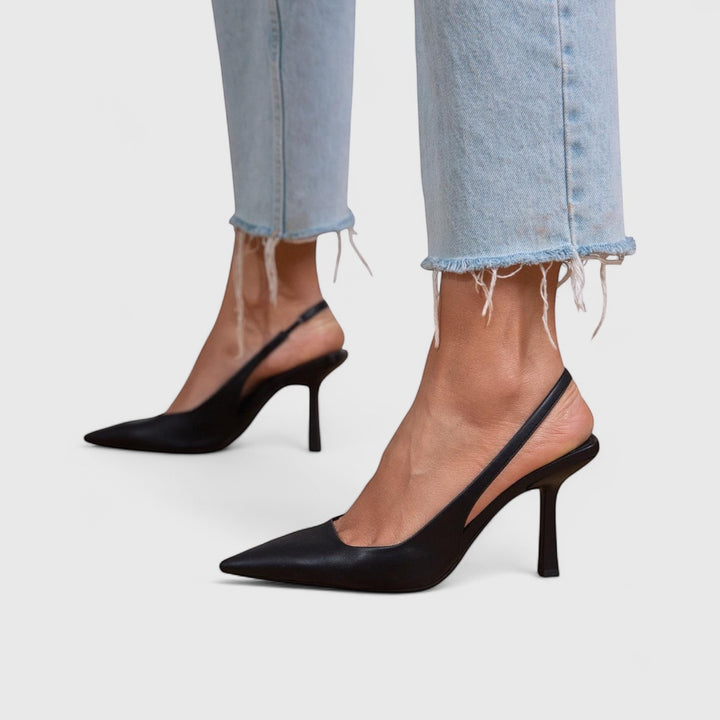 Vivian &amp; Cole Bella black leather pointed-toe slingback heels with orthopedic support.