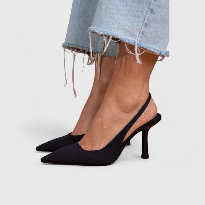 Vivian &amp; Cole Bella black slingback pointed toe heels with orthopedic support and a flared heel.