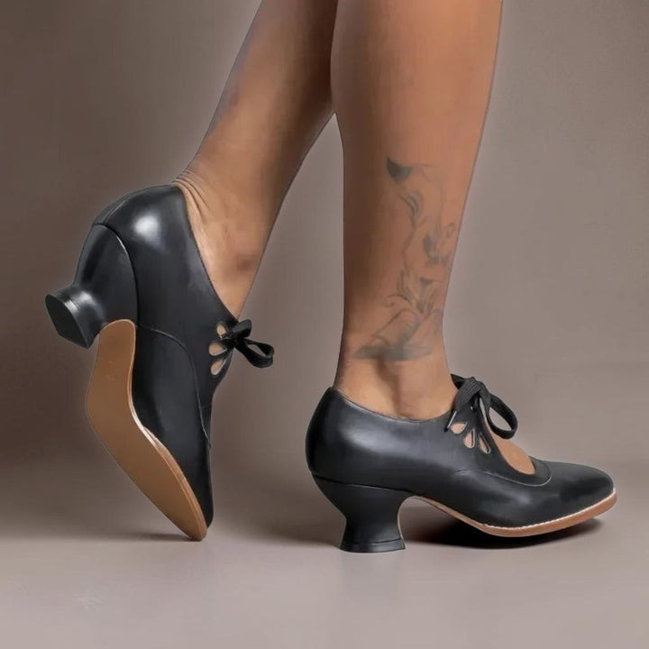 Vivian &amp; Cole Rosalind black vintage lace-up Mary Jane pumps with a rounded toe and comfortable low block heel