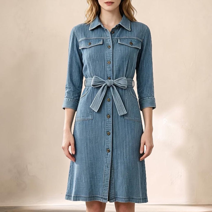 Vivian &amp; Cole Delphine blue corduroy shirt dress with a button-up front, collar, and a matching waist tie belt.