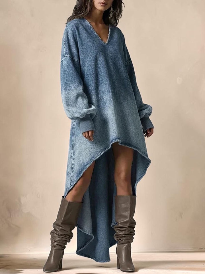 Vivian &amp; Cole blue denim maxi dress with V-neck, lantern sleeves, and a high-low hem worn with slouchy brown boots.