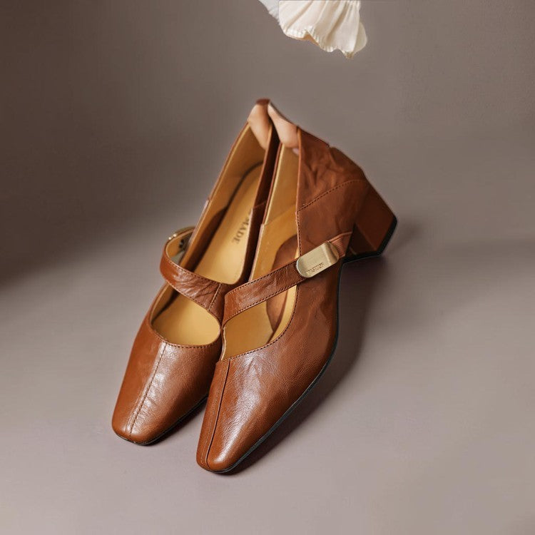 Vivian &amp; Cole brown leather Mary Jane pumps with a chiseled square toe, low block heel, and gold bit hardware detail.