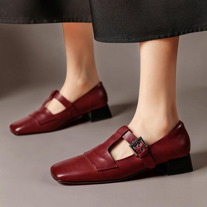 Vivian &amp; Cole Veyra burgundy genuine leather T-strap pumps with a square toe and stable block heel on a model