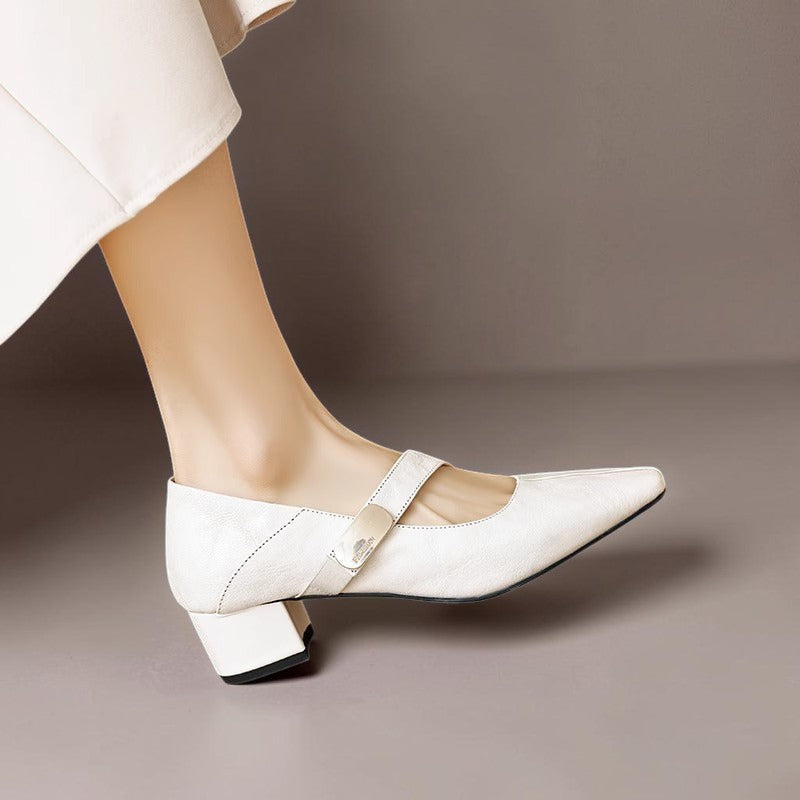 Vivian &amp; Cole cream leather Mary Jane pump with a chiseled square toe, gold bit accent, and low block heel.