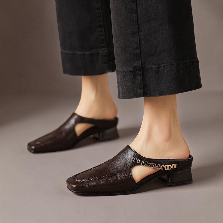 Vivian & Cole Vyla dark brown genuine leather mules with square toe, gold chain detail, and low block heel.