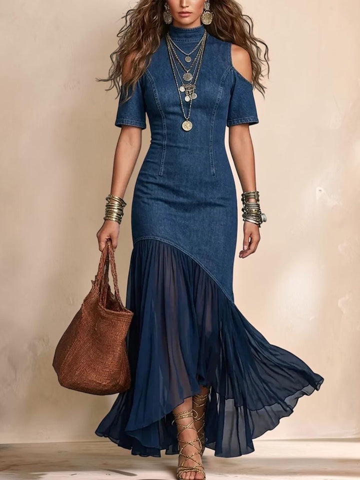 Vivian &amp; Cole deep blue denim maxi dress with cold shoulder cutouts and a flowing chiffon-spliced hem on a model