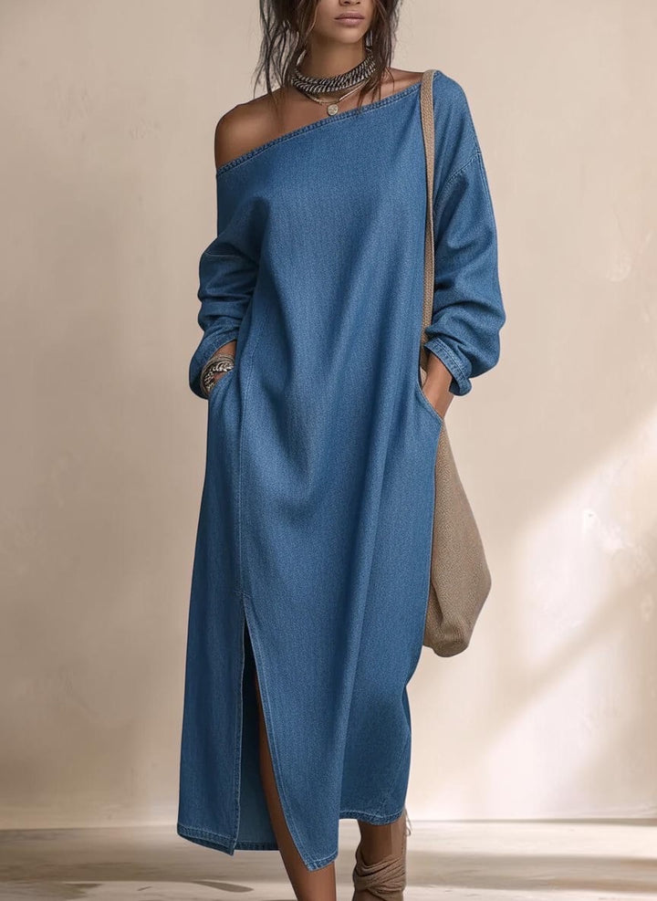 Vivian &amp; Cole blue denim maxi dress with off-the-shoulder neckline, balloon sleeves, and side slit on a model