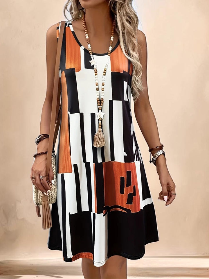 Vivian &amp; Cole Marguerite sleeveless A-line dress featuring a geometric black, white, and orange print