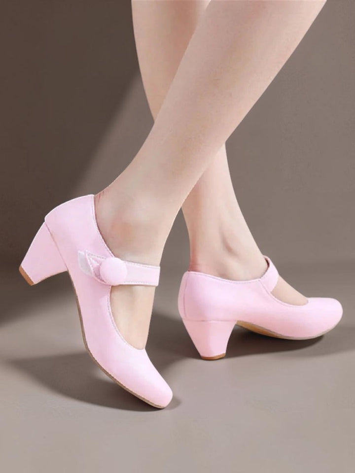 Vivian &amp; Cole Clementine pink block heel Mary Jane shoes with an adjustable instep strap and rounded toe.