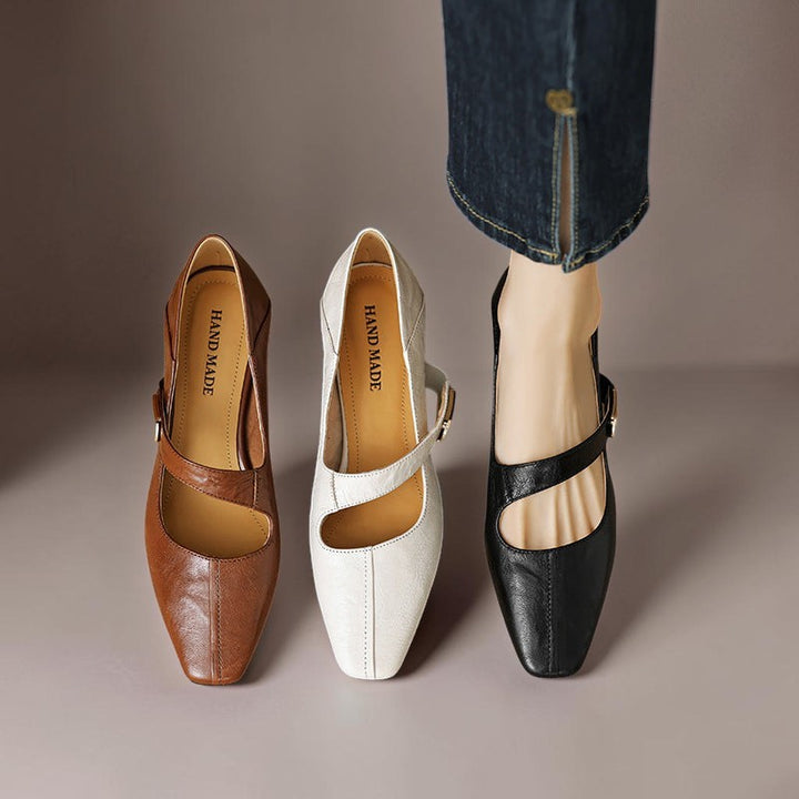 Vivian &amp; Cole Quera leather Mary Jane pumps in brown, cream, and black with chiseled square toes and low block heels.