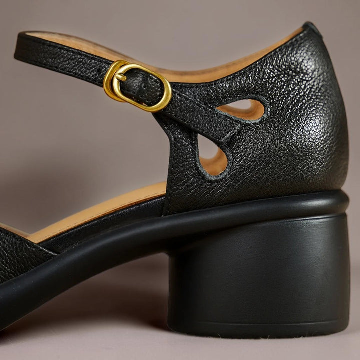 Vivian &amp; Cole Seraphine black platform sandals with an adjustable ankle strap and cushioned footbed