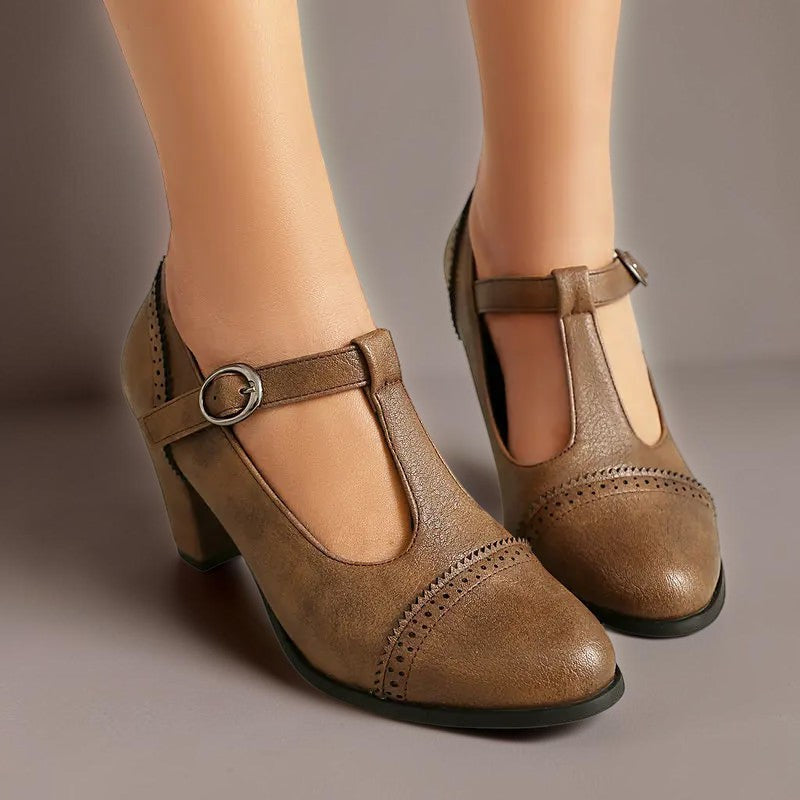 Vivian & Cole Wilhelmina brown T-strap brogue heels with classic punched detailing and a steady block heel